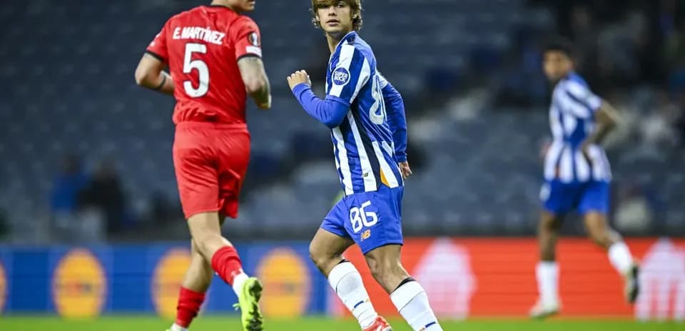 Porto player running during match against opponent