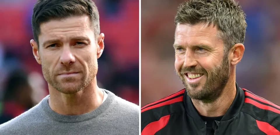 Two football coaches posing for photos