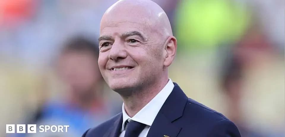 FIFA president at an event, smiling