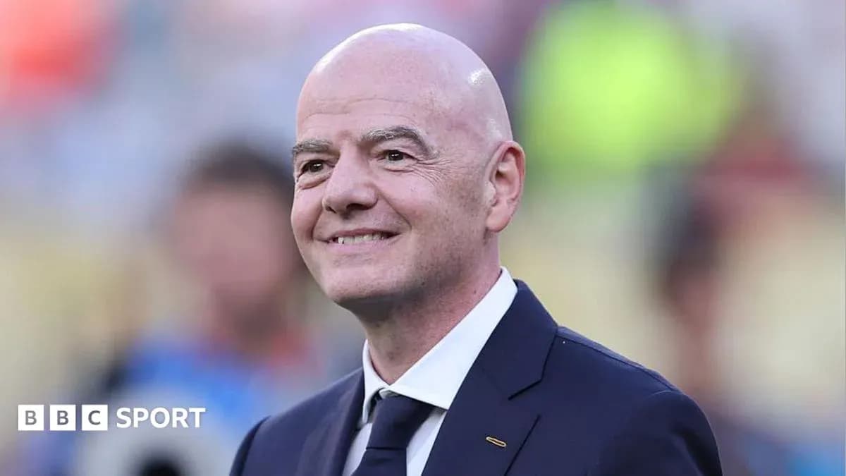 FIFA president at an event, smiling