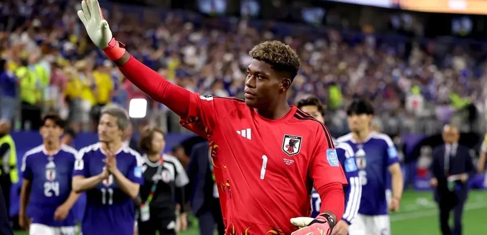 Goalkeeper waving to fans after match conclusion