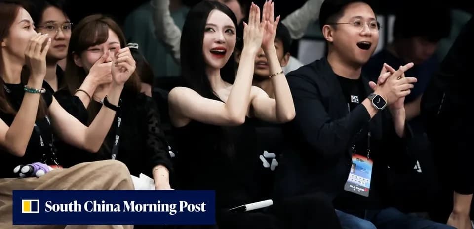 Fans applauding during an event in the audience