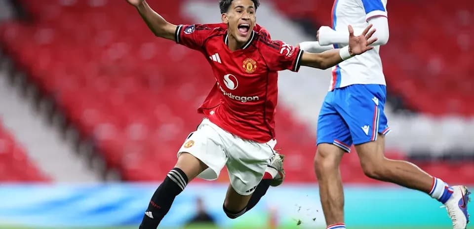Manchester United player celebrating a goal on pitch