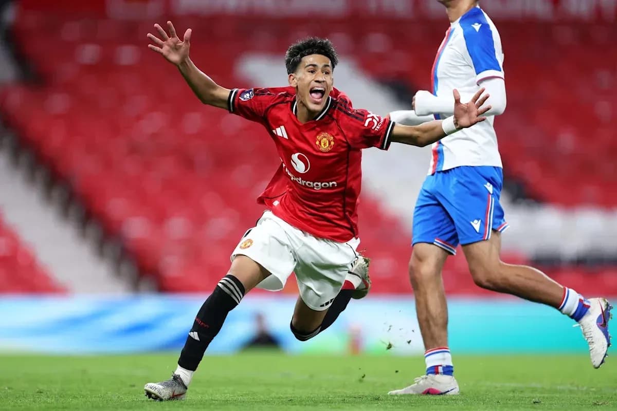 Manchester United player celebrating a goal on pitch