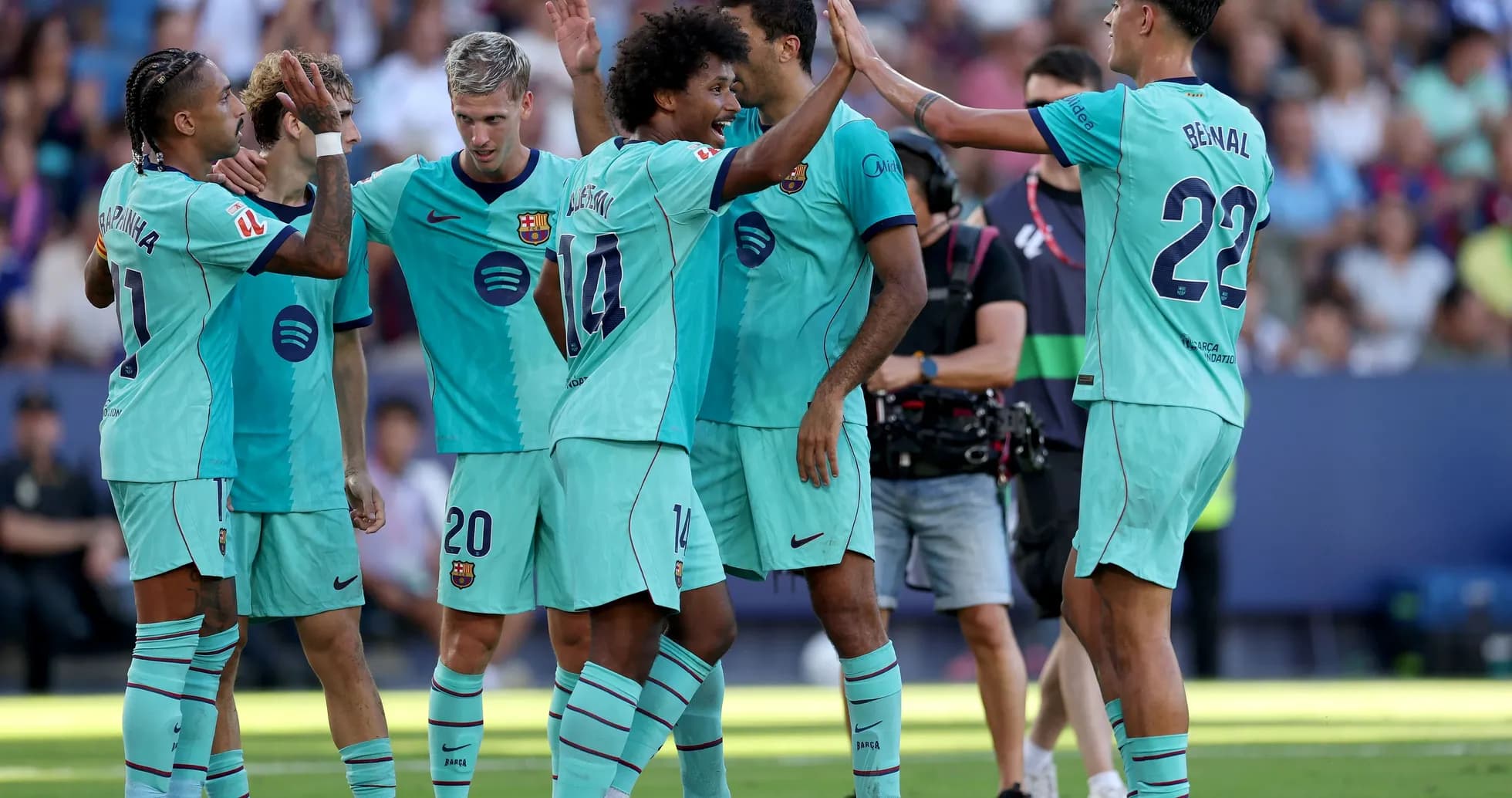 Barcelona players celebrating a goal together