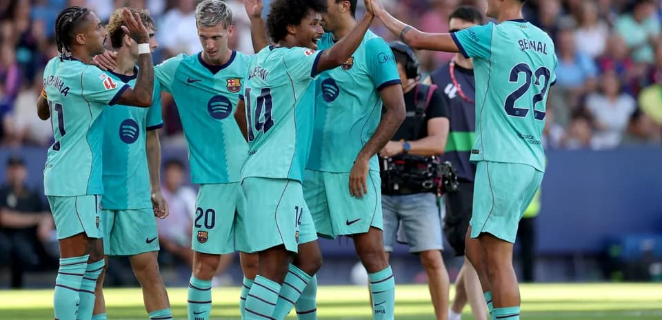 Barcelona players celebrating a goal together