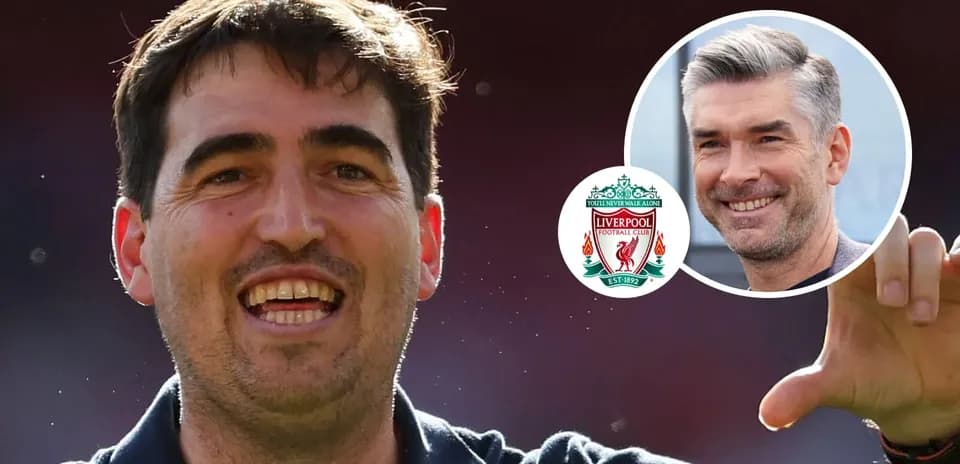 Coach celebrating with Liverpool FC logo in background