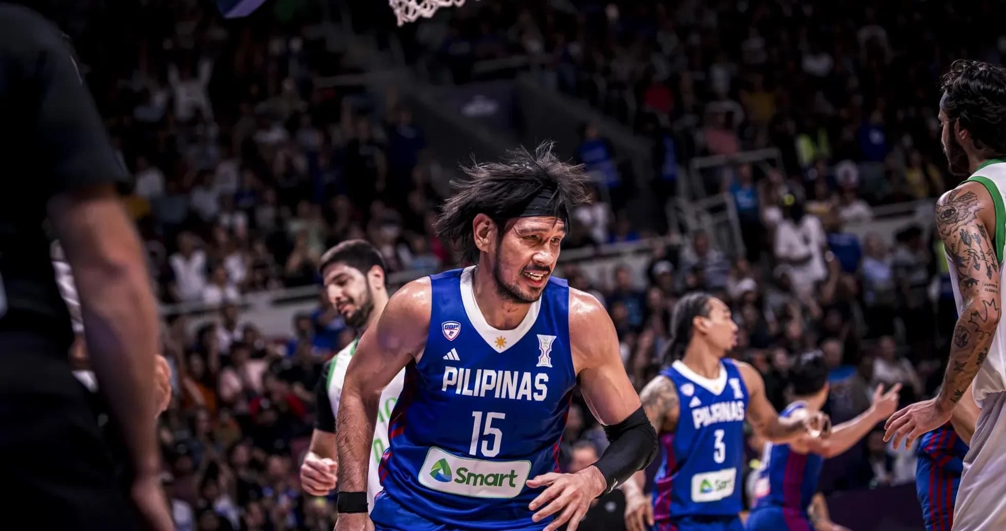 Basketball player in blue jersey during intense game