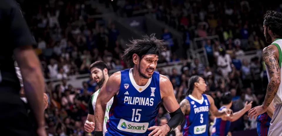 Basketball player in blue jersey during intense game