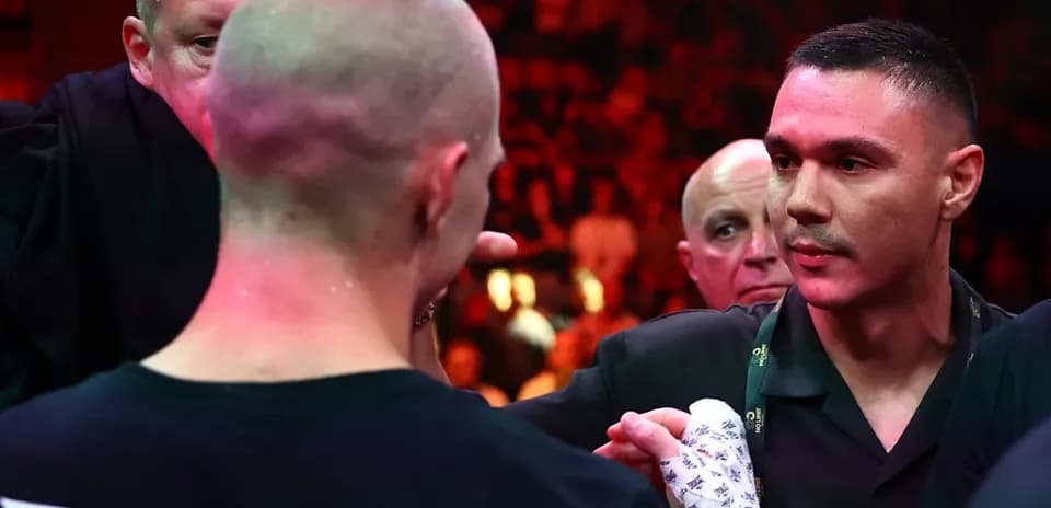 Boxer receiving instructions before the match