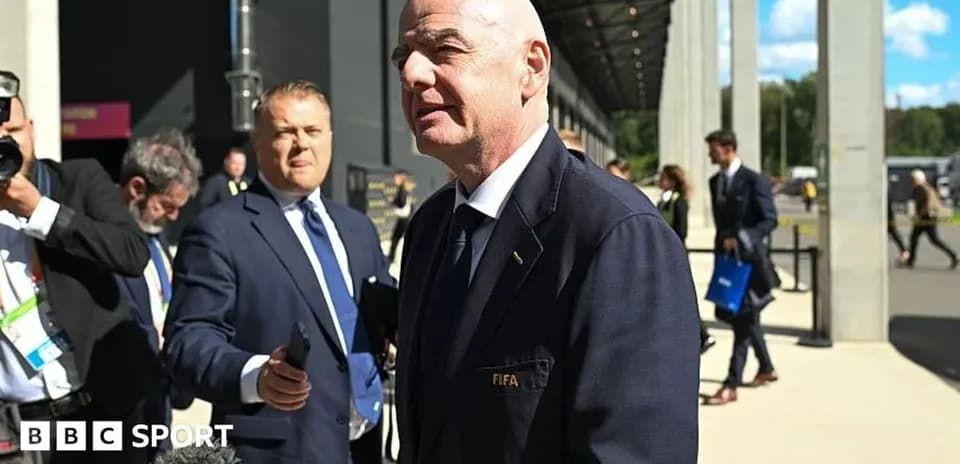 FIFA official speaking at event with reporters