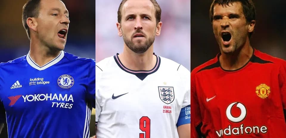 Three football players in team jerseys posing