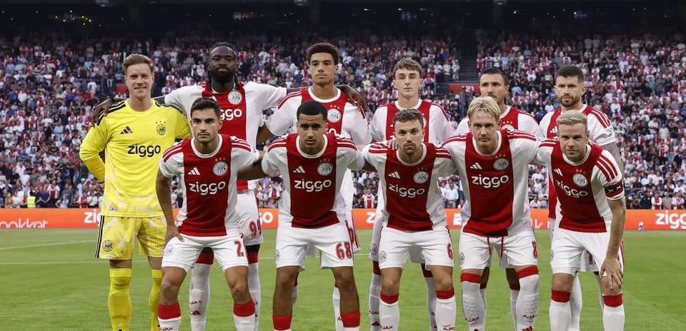 Ajax players posing for team photo before match