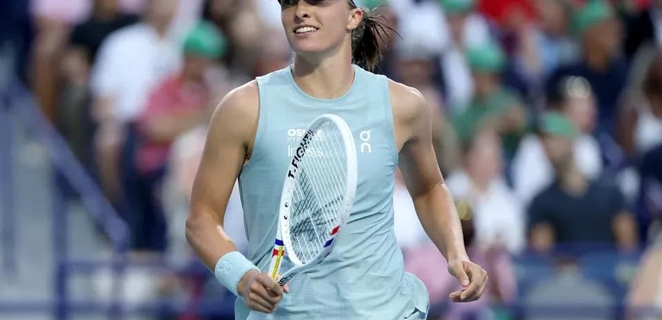 Tennis player celebrating during a match