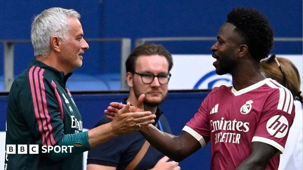 Mourinho and player shaking hands during match