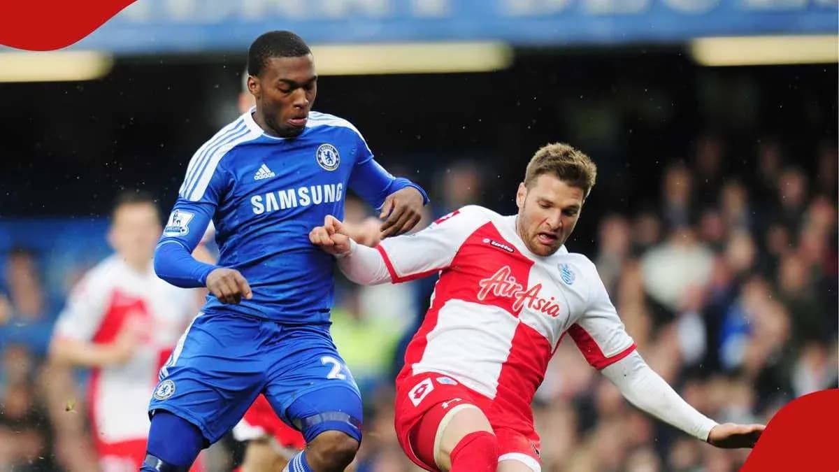 Two players contesting the ball during a match