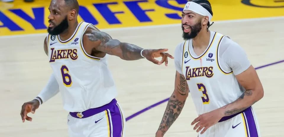 LeBron James and Anthony Davis celebrating on court