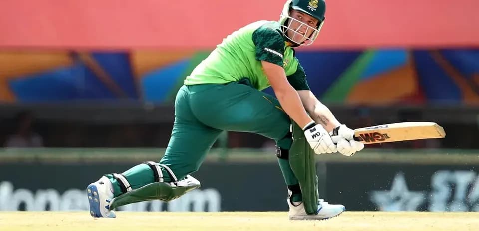 Batsman playing a shot during cricket match