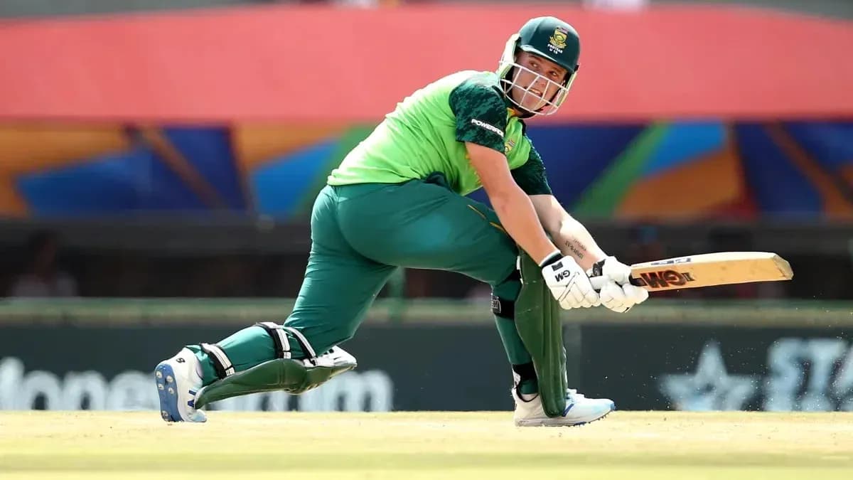 Batsman playing a shot during cricket match
