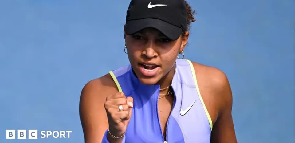Tennis player celebrating during a match