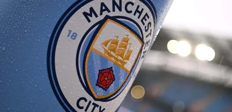 Manchester City club logo with raindrops