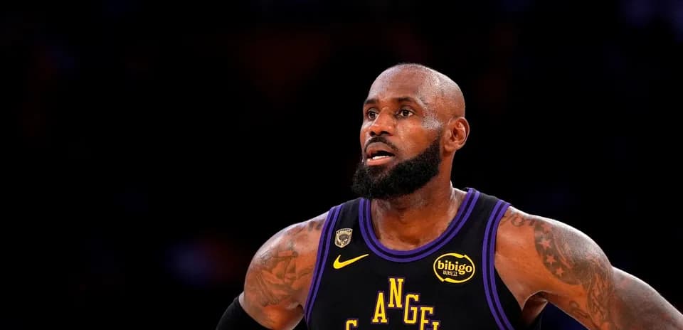 Basketball player in Los Angeles Lakers jersey on court