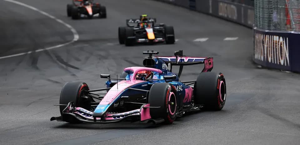 Formula 1 car racing on a street circuit