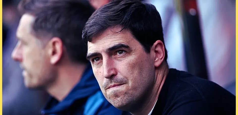 Coach observing the match from the sidelines