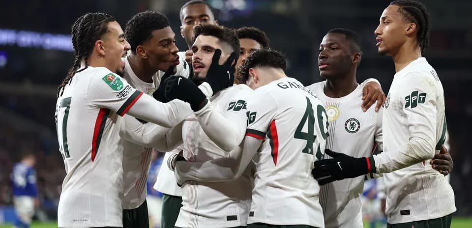 Chelsea players celebrating a goal together