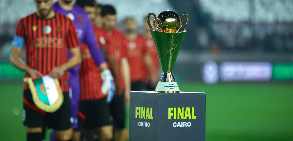 Final trophy displayed with players in background