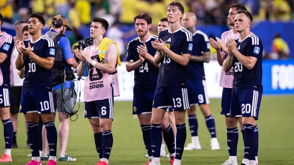Scotland players applauding fans after match