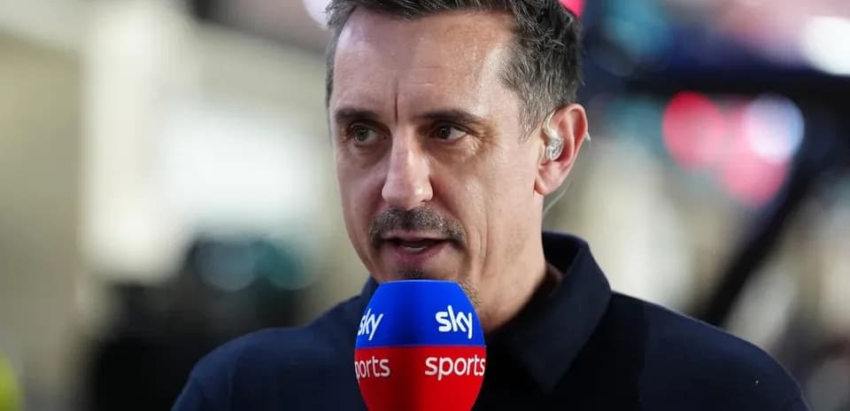 Sport analyst speaking into microphone during broadcast