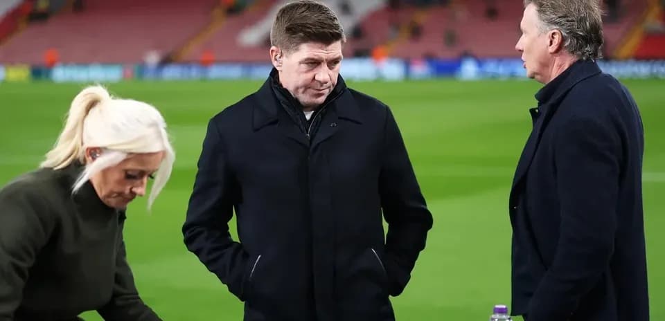 Three analysts discussing on the pitch before match