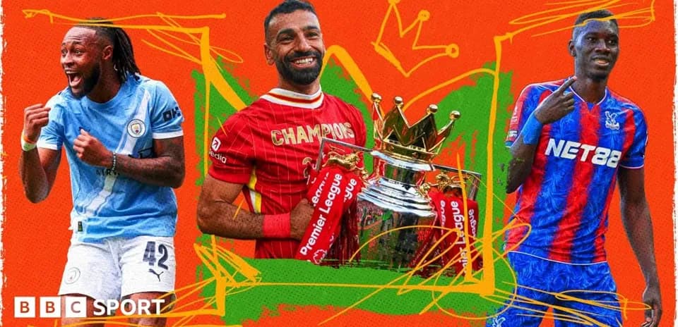 Three football players celebrating with trophy background