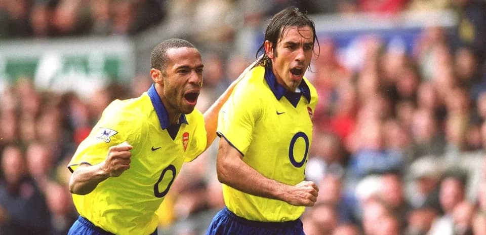Arsenal players celebrating a goal during match