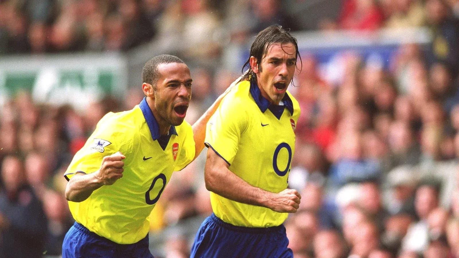 Arsenal players celebrating a goal during match