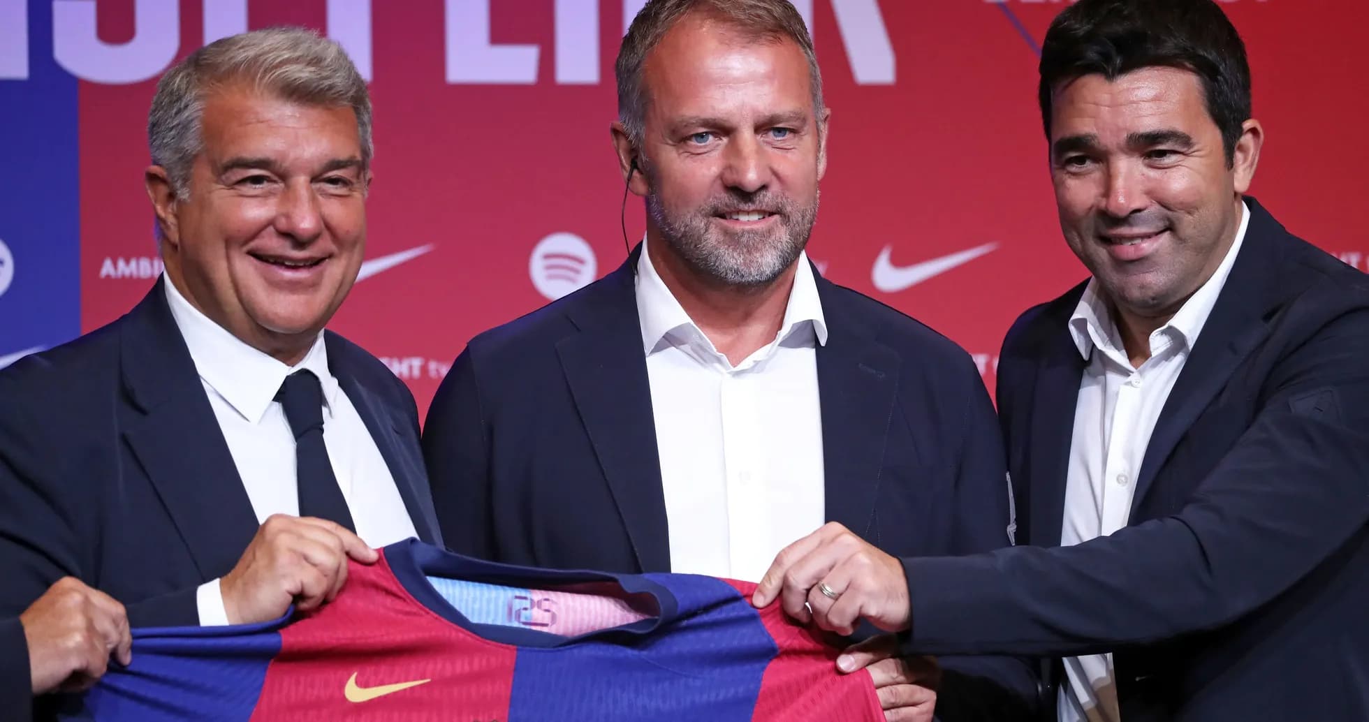 Officials presenting new FC Barcelona jersey at event
