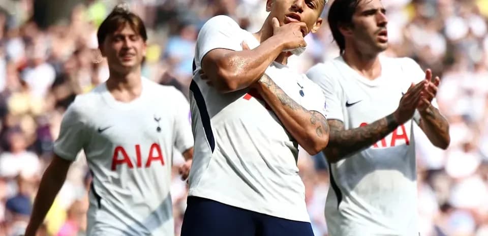 Tottenham players celebrating a goal during match