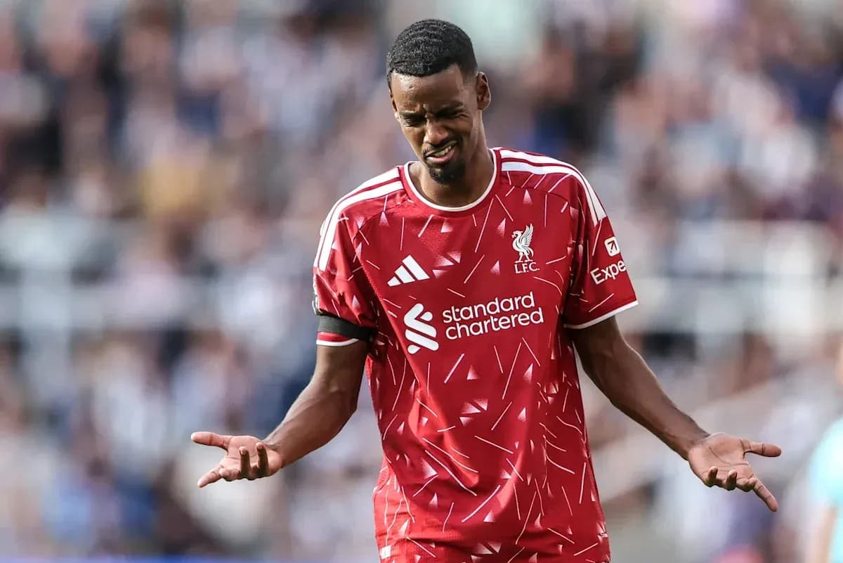 Liverpool player reacting during match on field Liverpool player reacting during match on field