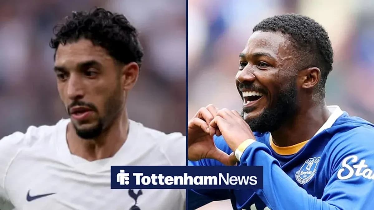 Two football players in action, one from Tottenham and one from Everton Two football players in action, one from Tottenham and one from Everton