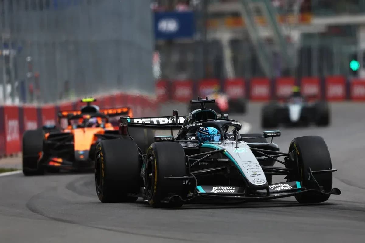 Formula 1 cars racing on city circuit Formula 1 cars racing on city circuit