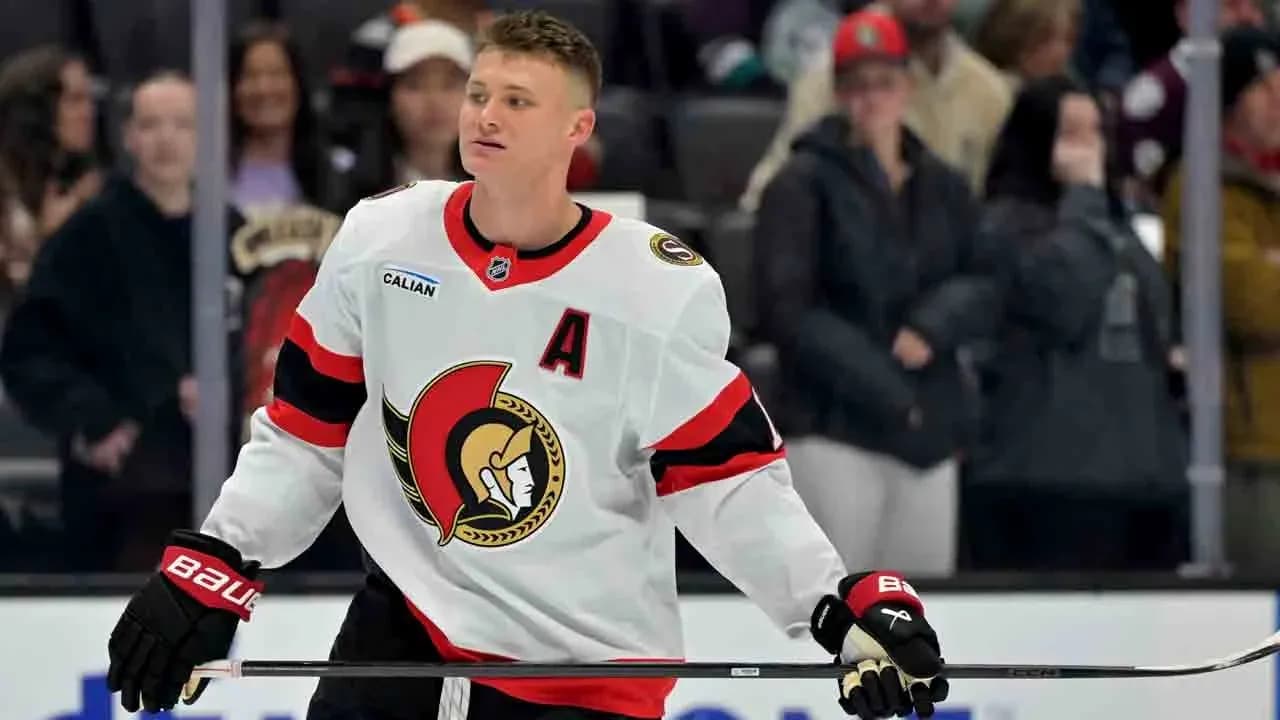 Hockey player on ice rink during game Hockey player on ice rink during game