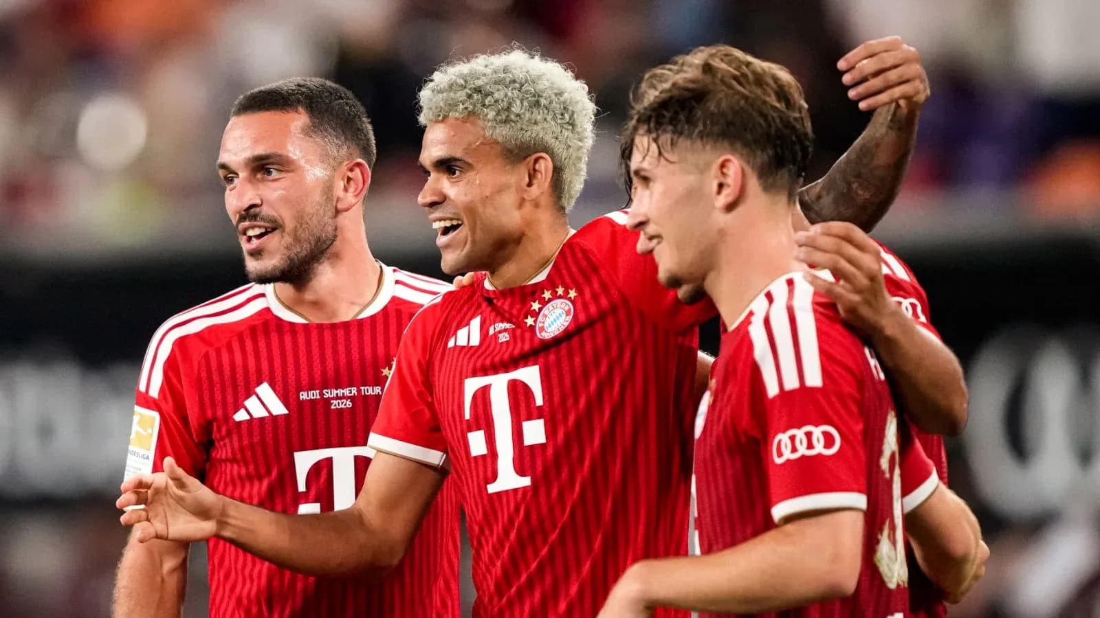 Bayern Munich players celebrating during a match Bayern Munich players celebrating during a match