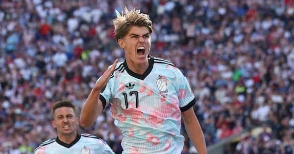 Player celebrating a goal during the match Player celebrating a goal during the match