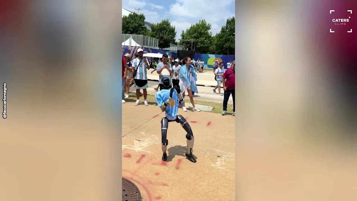 Robot dancing in front of spectators at event Robot dancing in front of spectators at event