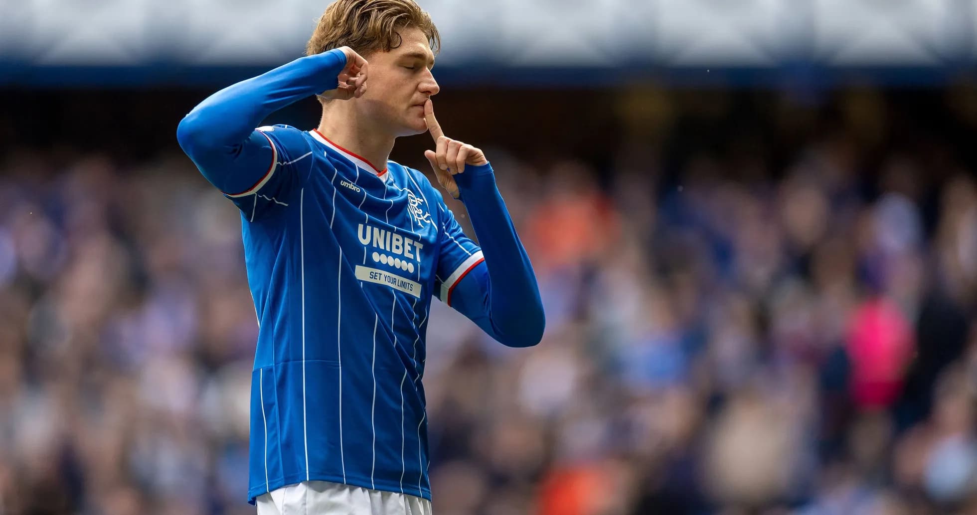 Rangers player shushing crowd after scoring goal Rangers player shushing crowd after scoring goal