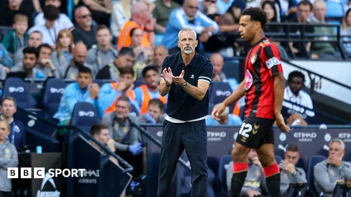 Bournemouth coach directing player during match Bournemouth coach directing player during match