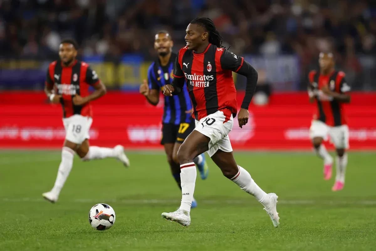 AC Milan player dribbling the ball during match AC Milan player dribbling the ball during match