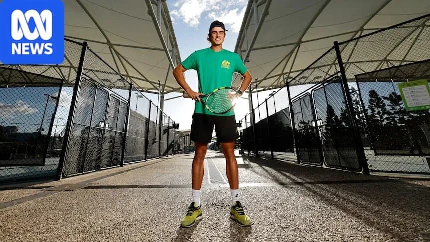 Tennis player posing with racket on court Tennis player posing with racket on court