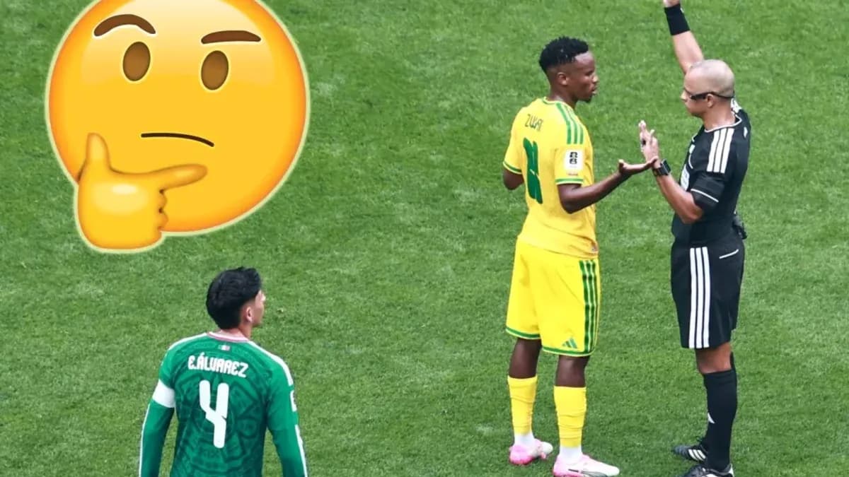 Player discussing with referee during match Player discussing with referee during match
